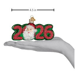 Detail of the glittered red 2026 numerals on the Old World Christmas Santa ornament