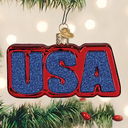 Old World Christmas USA glass ornament with glittered USA lettering and American flag reverse