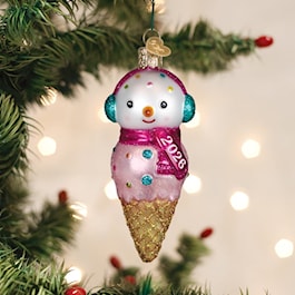 Old World Christmas 2026 snowman glass ornament with earmuffs and stacked double-scoop shape