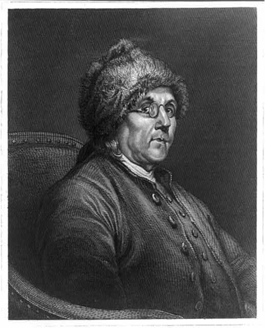 Benjamin Franklin, seated, wearing his fur cap and spectacles. Engraving dated about 1777, artist not recorded. Library of Congress Prints and Photographs Division, LC-USZ62-52484.
