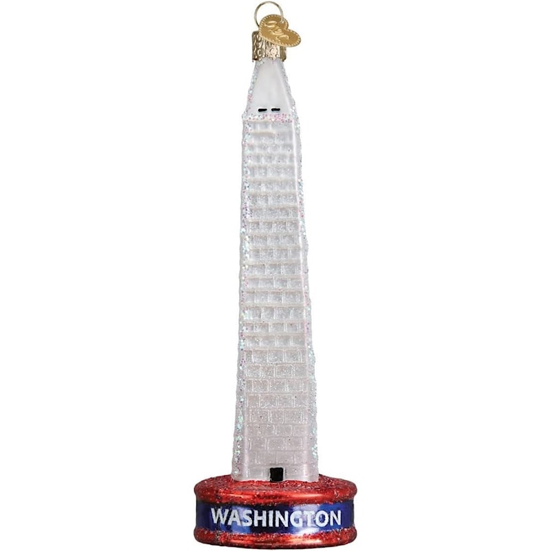 Old World Christmas Washington Monument glass ornament, front view on a white background